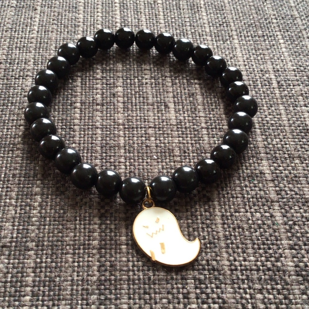 Chic Black Beaded Bracelet with Gold Ghost Charm